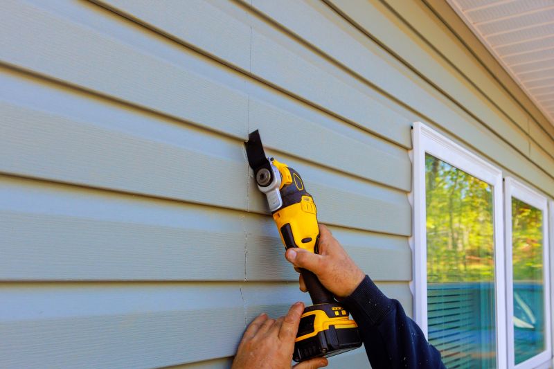 Installing siding on a home exterior